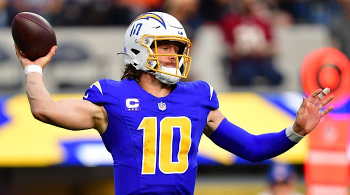 Chargers quarterback Justin Herbert throws a pass during a game.